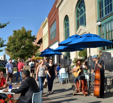 image of outdoor music being played with a crowd